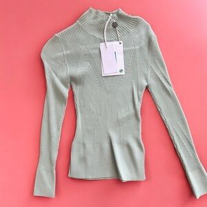 Brand new turtleneck sweater size S.